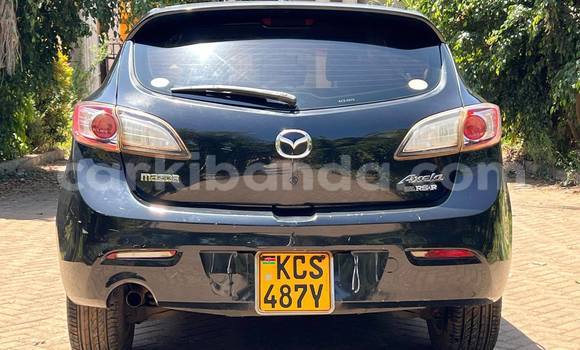 Gura Yakoze Mazda Axela Black Imodoka i Kampala mu Uganda Gura Yakoze Mazda Axela Black Imodoka i Kampala mu Uganda