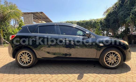 Gura Yakoze Mazda Axela Black Imodoka i Kampala mu Uganda Gura Yakoze Mazda Axela Black Imodoka i Kampala mu Uganda