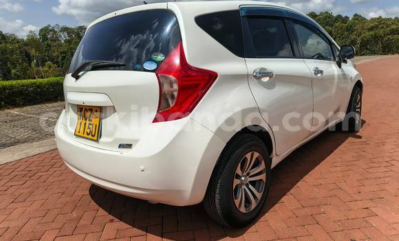 Gura Yakoze Nissan Note White Imodoka i Kampala mu Uganda Gura Yakoze Nissan Note White Imodoka i Kampala mu Uganda