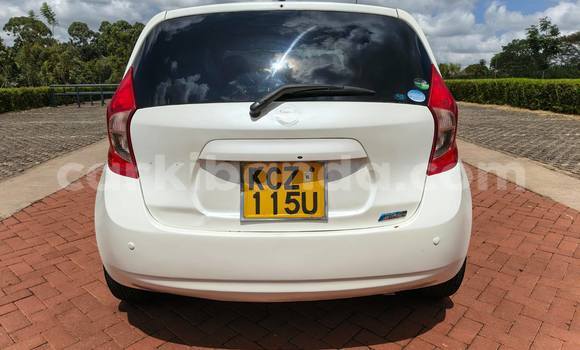Gura Yakoze Nissan Note White Imodoka i Kampala mu Uganda Gura Yakoze Nissan Note White Imodoka i Kampala mu Uganda