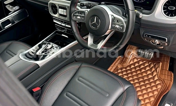 Nunua Ilio tumika Mercedes‒Benz G-klasse Nyeupe Gari ndani ya Kampala nchini Uganda Nunua Ilio tumika Mercedes‒Benz G-klasse Nyeupe Gari ndani ya Kampala nchini Uganda