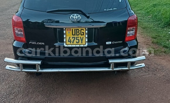 Gura Yakoze Toyota Fielder Black Imodoka i Kampala mu Uganda Gura Yakoze Toyota Fielder Black Imodoka i Kampala mu Uganda