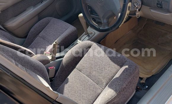 Buy Used Toyota Corolla White Car in Kampala in Uganda Buy Used Toyota Corolla White Car in Kampala in Uganda