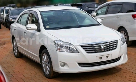 Gura Yakoze Toyota Premio White Imodoka i Kampala mu Uganda Gura Yakoze Toyota Premio White Imodoka i Kampala mu Uganda