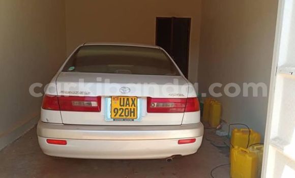 Gura Yakoze Toyota Premio White Imodoka i Kampala mu Uganda Gura Yakoze Toyota Premio White Imodoka i Kampala mu Uganda