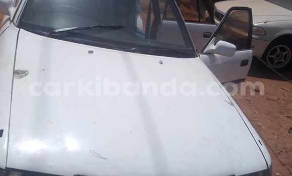 Gura Yakoze Toyota Corona White Imodoka i Kampala mu Uganda Gura Yakoze Toyota Corona White Imodoka i Kampala mu Uganda