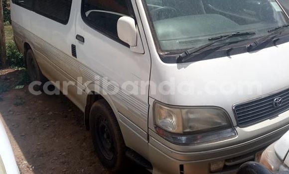 Gura Yakoze Toyota Super Custom White Imodoka i Kampala mu Uganda Gura Yakoze Toyota Super Custom White Imodoka i Kampala mu Uganda