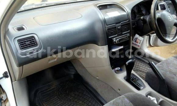 Gura Yakoze Toyota Caldina White Imodoka i Kampala mu Uganda Gura Yakoze Toyota Caldina White Imodoka i Kampala mu Uganda