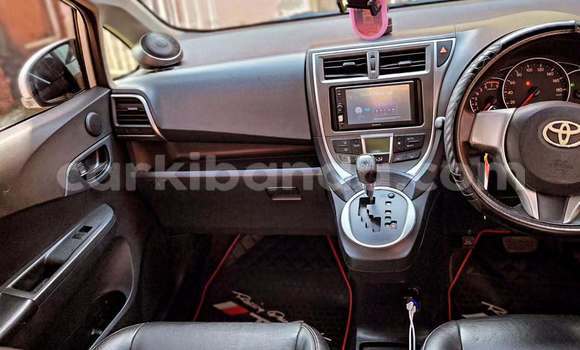 Gura Yakoze Toyota Ractis White Imodoka i Kampala mu Uganda Gura Yakoze Toyota Ractis White Imodoka i Kampala mu Uganda
