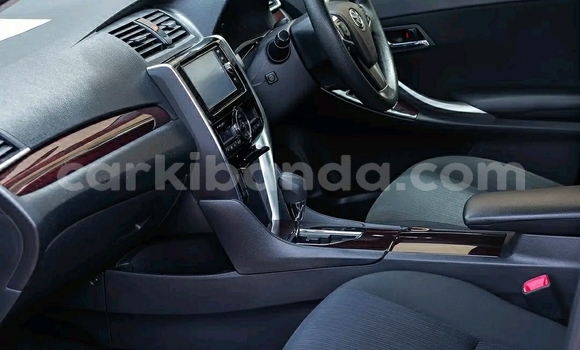 Gura Yakoze Toyota Allion White Imodoka i Kampala mu Uganda Gura Yakoze Toyota Allion White Imodoka i Kampala mu Uganda