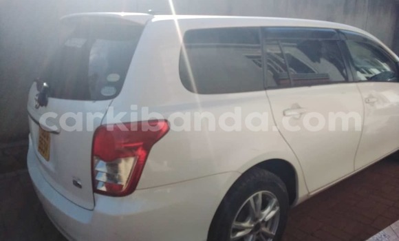 Gura Yakoze Toyota Fielder White Imodoka i Kampala mu Uganda Gura Yakoze Toyota Fielder White Imodoka i Kampala mu Uganda