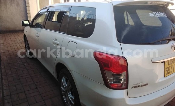 Gura Yakoze Toyota Fielder White Imodoka i Kampala mu Uganda Gura Yakoze Toyota Fielder White Imodoka i Kampala mu Uganda