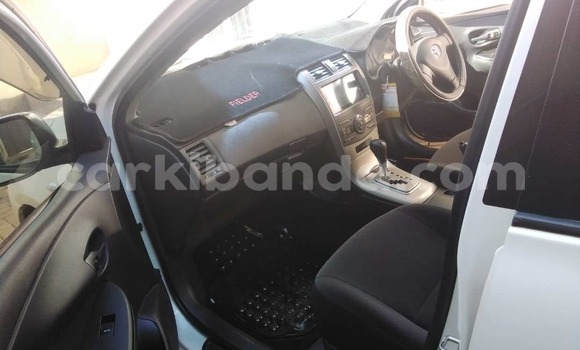 Gura Yakoze Toyota Fielder White Imodoka i Kampala mu Uganda Gura Yakoze Toyota Fielder White Imodoka i Kampala mu Uganda
