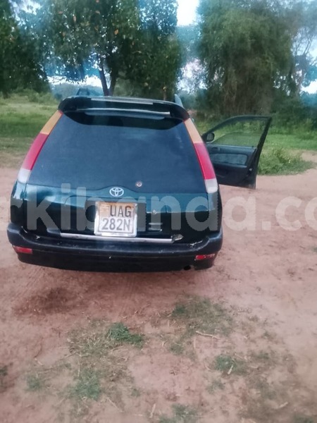 Big with watermark toyota carib rosso uganda jinja 26554