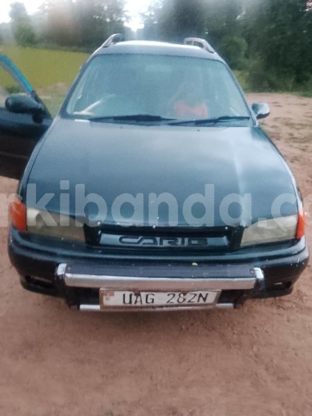 Big with watermark toyota carib rosso uganda jinja 26554