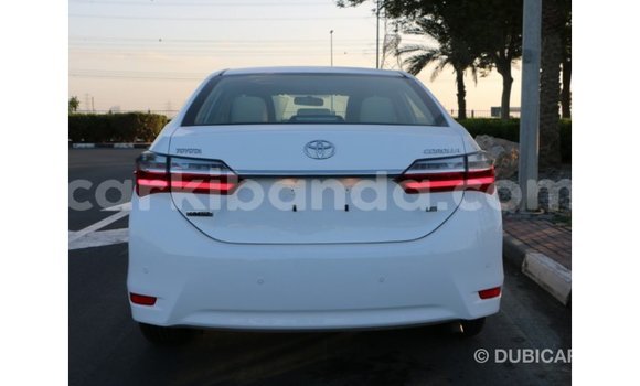 Buy Import Toyota Corolla White Car in Import - Dubai in Uganda Buy Import Toyota Corolla White Car in Import - Dubai in Uganda