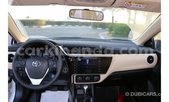 Buy Import Toyota Corolla White Car in Import - Dubai in Uganda Buy Import Toyota Corolla White Car in Import - Dubai in Uganda