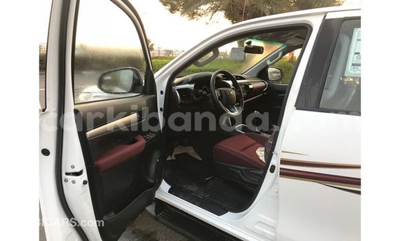 Buy Import Toyota Hilux White Car in Import - Dubai in Uganda Buy Import Toyota Hilux White Car in Import - Dubai in Uganda