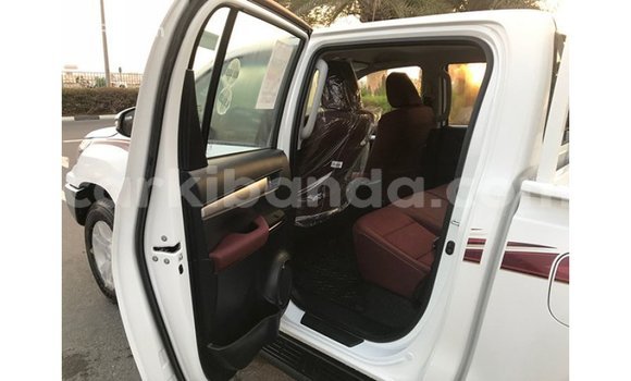 Buy Import Toyota Hilux White Car in Import - Dubai in Uganda Buy Import Toyota Hilux White Car in Import - Dubai in Uganda