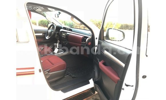 Buy Import Toyota Hilux White Car in Import - Dubai in Uganda Buy Import Toyota Hilux White Car in Import - Dubai in Uganda