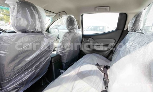 Acheter Import Voiture Mitsubishi L200 Blanc à Import - Dubai, Ouganda Acheter Import Voiture Mitsubishi L200 Blanc à Import - Dubai, Ouganda