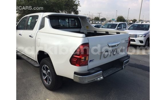 Buy Import Toyota Hilux White Car in Import - Dubai in Uganda Buy Import Toyota Hilux White Car in Import - Dubai in Uganda