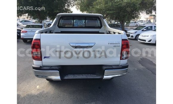 Buy Import Toyota Hilux White Car in Import - Dubai in Uganda Buy Import Toyota Hilux White Car in Import - Dubai in Uganda