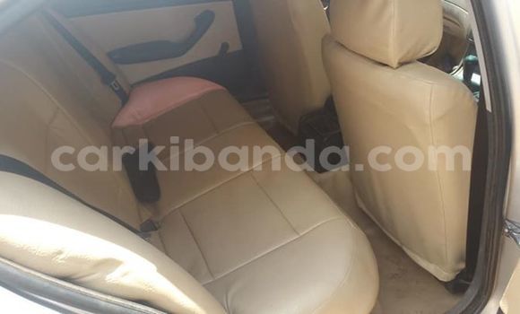 Gura Yakoze BMW 3–Series Silver Imodoka i Kampala mu Uganda Gura Yakoze BMW 3–Series Silver Imodoka i Kampala mu Uganda