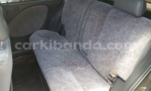 Gura Yakoze Toyota Raum Silver Imodoka i Kampala mu Uganda Gura Yakoze Toyota Raum Silver Imodoka i Kampala mu Uganda