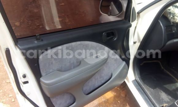 Buy Used Toyota Raum White Car in Kampala in Uganda Buy Used Toyota Raum White Car in Kampala in Uganda