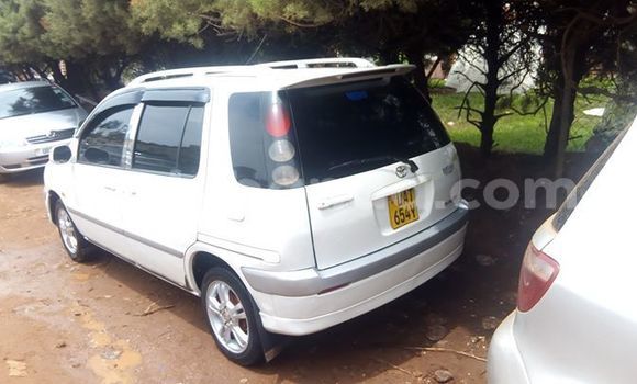 Buy Used Toyota Raum White Car in Kampala in Uganda Buy Used Toyota Raum White Car in Kampala in Uganda