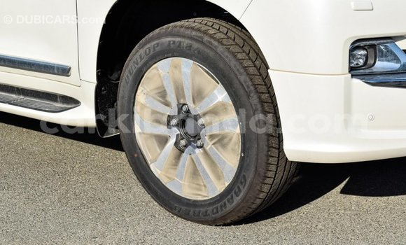 Gura Imported Toyota Land Cruiser White Imodoka i Import - Dubai mu Uganda Gura Imported Toyota Land Cruiser White Imodoka i Import - Dubai mu Uganda