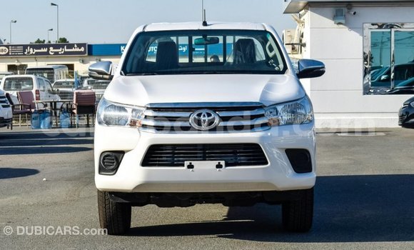 Gura Imported Toyota Hilux White Imodoka i Import - Dubai mu Uganda Gura Imported Toyota Hilux White Imodoka i Import - Dubai mu Uganda