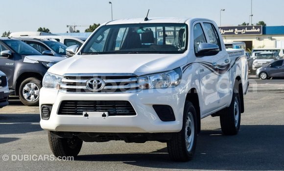 Gura Imported Toyota Hilux White Imodoka i Import - Dubai mu Uganda Gura Imported Toyota Hilux White Imodoka i Import - Dubai mu Uganda