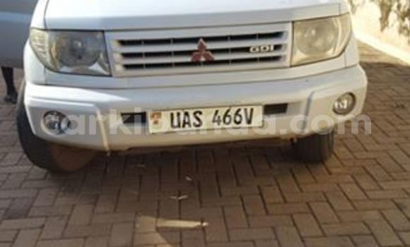 Buy Used Mitsubishi Carisma White Car in Kampala in Uganda