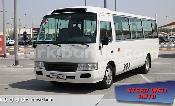 Gura Imported Toyota Coaster White Imodoka i Import - Dubai mu Uganda Gura Imported Toyota Coaster White Imodoka i Import - Dubai mu Uganda