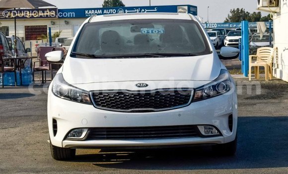 Gura Imported Kia Cerato White Imodoka i Import - Dubai mu Uganda Gura Imported Kia Cerato White Imodoka i Import - Dubai mu Uganda