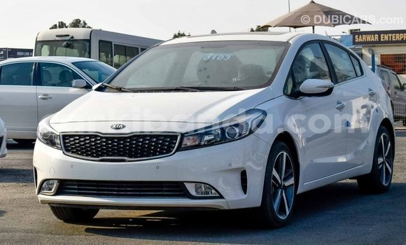 Gura Imported Kia Cerato White Imodoka i Import - Dubai mu Uganda Gura Imported Kia Cerato White Imodoka i Import - Dubai mu Uganda