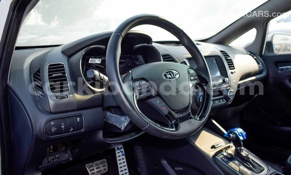 Gura Imported Kia Cerato White Imodoka i Import - Dubai mu Uganda Gura Imported Kia Cerato White Imodoka i Import - Dubai mu Uganda