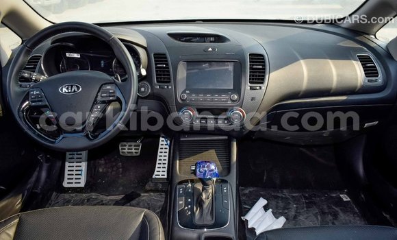 Gura Imported Kia Cerato White Imodoka i Import - Dubai mu Uganda Gura Imported Kia Cerato White Imodoka i Import - Dubai mu Uganda