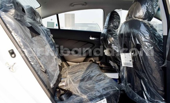 Gura Imported Kia Cerato White Imodoka i Import - Dubai mu Uganda Gura Imported Kia Cerato White Imodoka i Import - Dubai mu Uganda