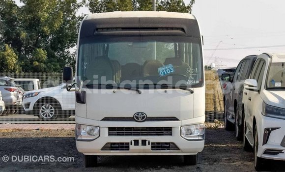 Gura Imported Toyota Coaster White Imodoka i Import - Dubai mu Uganda Gura Imported Toyota Coaster White Imodoka i Import - Dubai mu Uganda