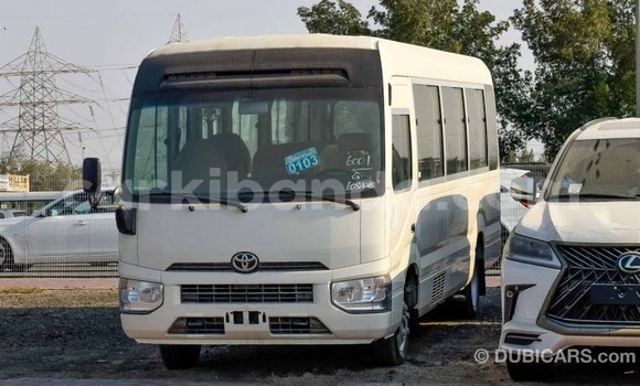 Gura Imported Toyota Coaster White Imodoka i Import - Dubai mu Uganda Gura Imported Toyota Coaster White Imodoka i Import - Dubai mu Uganda