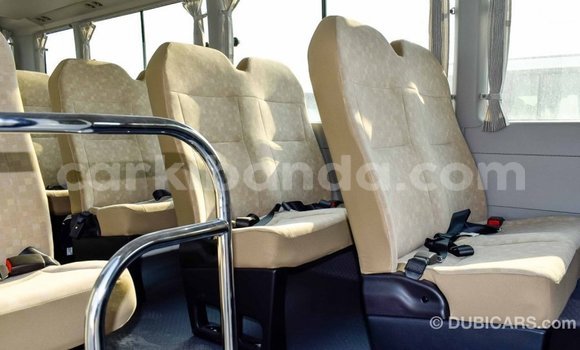 Gura Imported Toyota Coaster White Imodoka i Import - Dubai mu Uganda Gura Imported Toyota Coaster White Imodoka i Import - Dubai mu Uganda