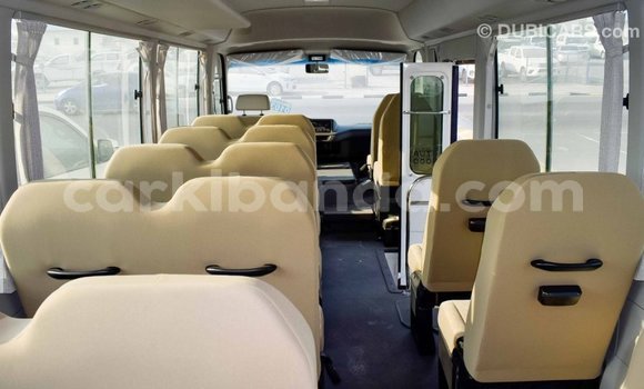 Gura Imported Toyota Coaster White Imodoka i Import - Dubai mu Uganda Gura Imported Toyota Coaster White Imodoka i Import - Dubai mu Uganda