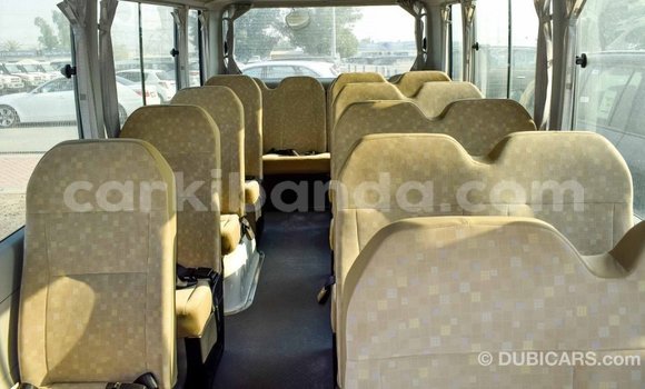 Gura Imported Toyota Coaster White Imodoka i Import - Dubai mu Uganda Gura Imported Toyota Coaster White Imodoka i Import - Dubai mu Uganda