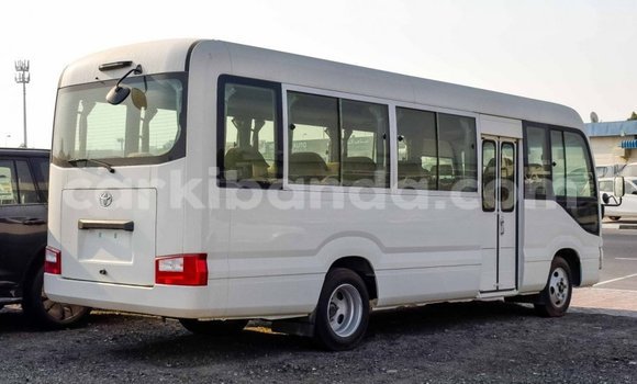 Gura Imported Toyota Coaster White Imodoka i Import - Dubai mu Uganda Gura Imported Toyota Coaster White Imodoka i Import - Dubai mu Uganda