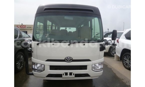 Gura Imported Toyota Coaster White Imodoka i Import - Dubai mu Uganda Gura Imported Toyota Coaster White Imodoka i Import - Dubai mu Uganda