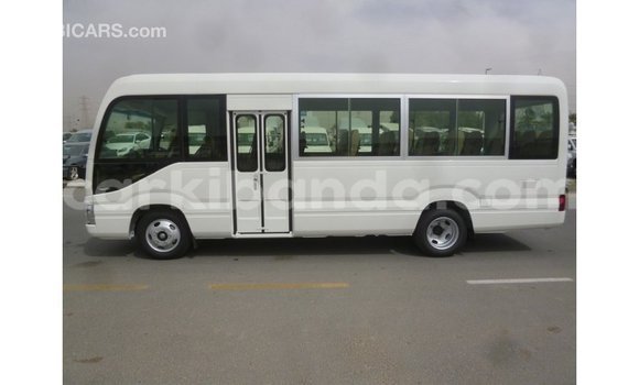 Gura Imported Toyota Coaster White Imodoka i Import - Dubai mu Uganda Gura Imported Toyota Coaster White Imodoka i Import - Dubai mu Uganda