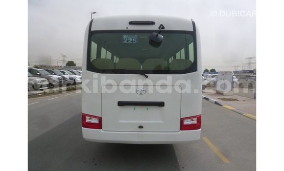 Gura Imported Toyota Coaster White Imodoka i Import - Dubai mu Uganda Gura Imported Toyota Coaster White Imodoka i Import - Dubai mu Uganda